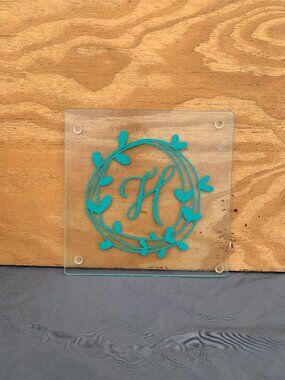 Monogrammed "H" 7.5" x 7.5" glass trivet w/ foot pads, footed hot plate, hot pad